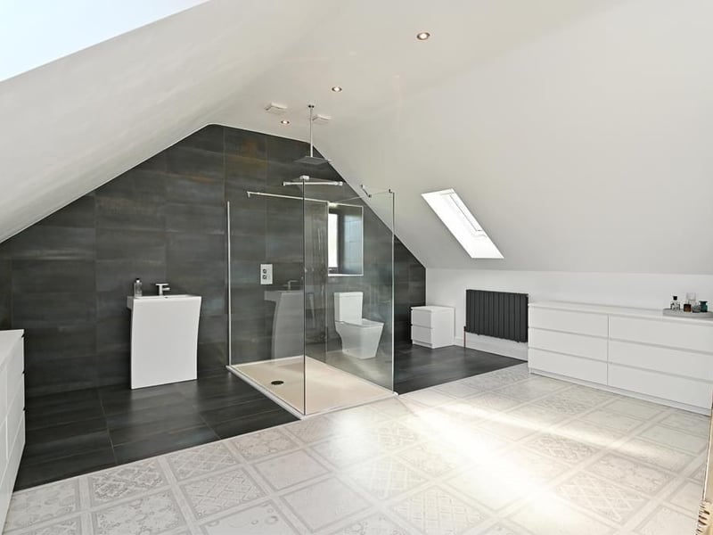 This spacious bathroom is the only other room on the second floor. (Photo courtesy of Zoopla)