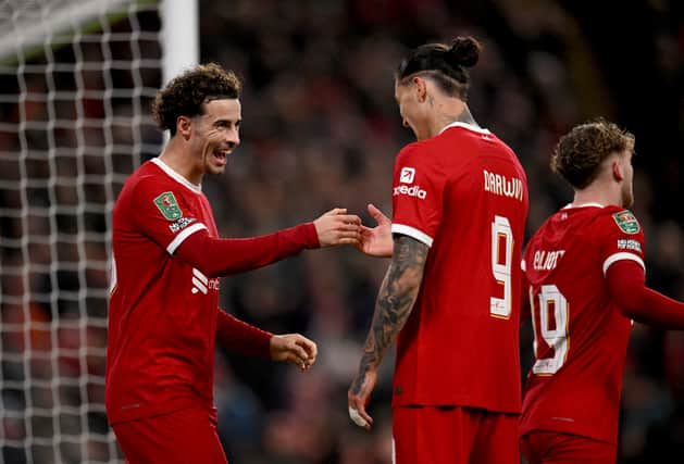 Curtis Jones of Liverpool celebrates after scoring the second goal with Darwin Nunez of Liverpool during the Carabao Cup Quarter Final match between Liverpool and West Ham United at Anfield on December 20, 2023 in Liverpool, England. (Photo by Andrew Powell/Liverpool FC via Getty Images)