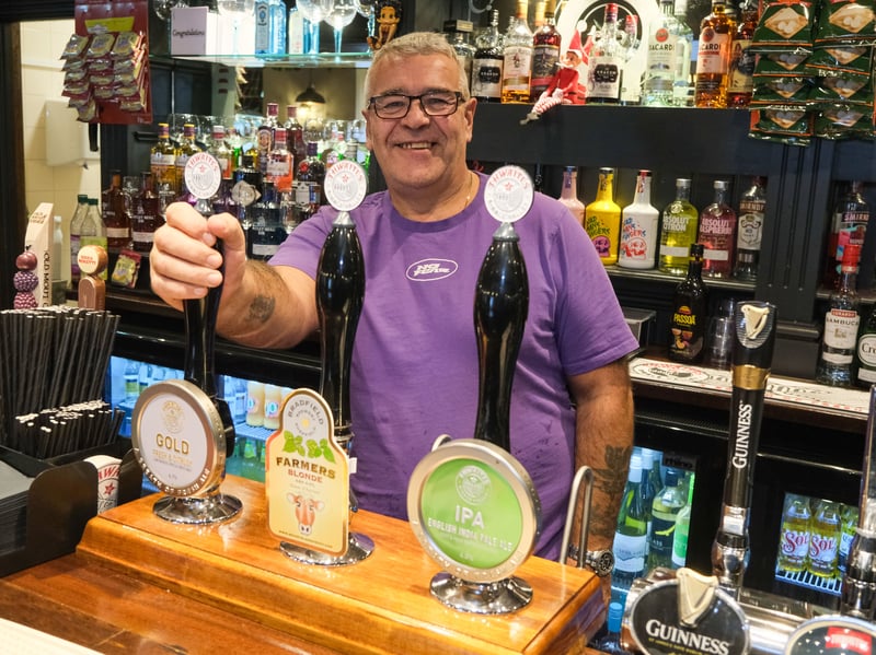 Landlord Tony Crofts behind the bar at The Blue Ball Inn, in Wharncliffe Side, Sheffield, which has reopened after a long closure