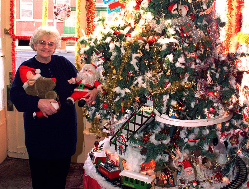 Pauline Bartlam with the giant Christmas tree in 'Paulines'  Cafe, on Grasmere Road 