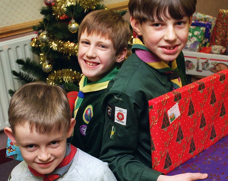 Blackpool district cubs, scouts and beavers collected money and presents for the United for Christmas appeal. L-R Matthew Kilcoyne,Alan Wrigley and Ben Sly