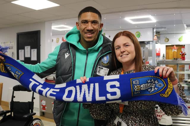 Football stars from Sheffield United and Sheffield Wednesday brought some children's Christmas wishes to life at Bluebell Wood. (Photo courtesy of Bluebell Wood Children's Hospice)