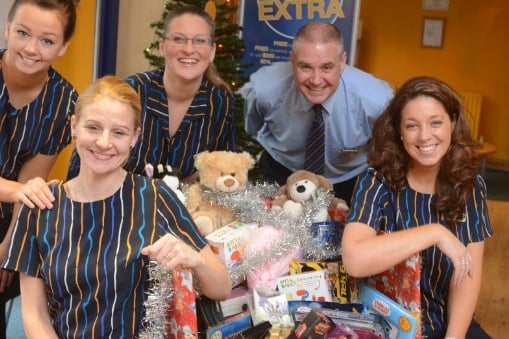 Hays Travel staff with some of the donations for the Echo's Christmas Toy Appeal in 2013.
They were all smiles and so was Sam Bailey with Skyscraper which was the Christmas number one.