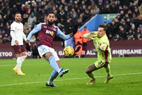 Douglas Luiz of Aston Villa has a shot against Ederson of Manchester City during the Premier League match between the sides at Villa Park on December 06, 2023 in Birmingham, England. (Photo by Michael Regan/Getty Images)