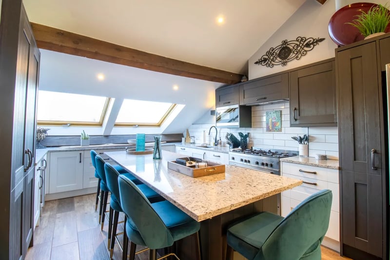 The modern kitchen has Velux skylights.