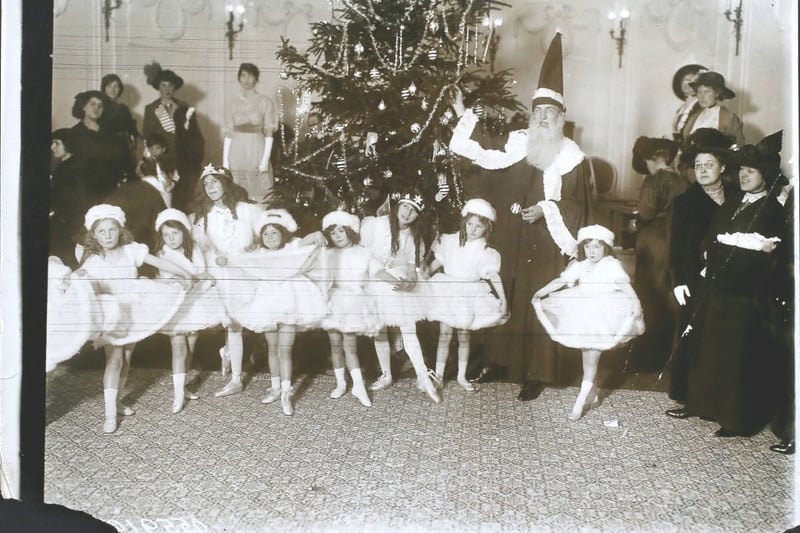Father Christmas attends the Ballet of Jack Frost and the Snowflakes, during a Christmas Fair in aid of the Royal Free Hospital at the Ritz Hotel in London. (Photo by Hulton Archive/Getty Images)
