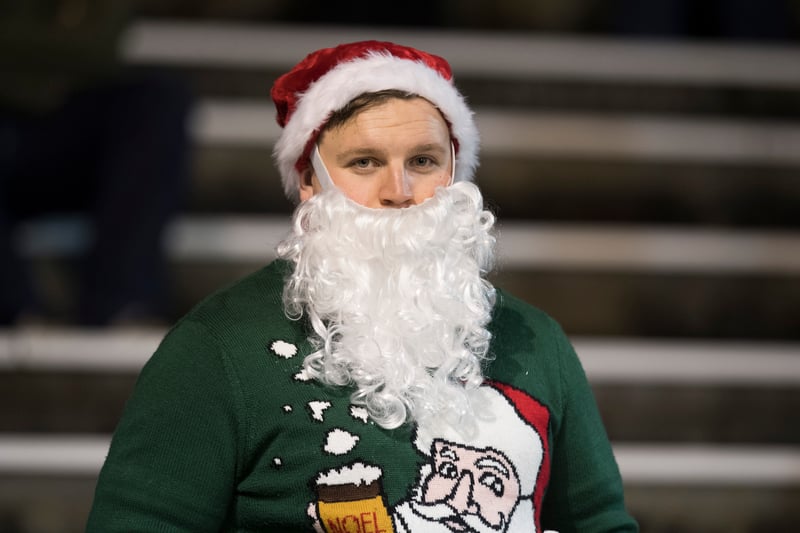 One Hibs fans goes all out with a hat, beard and Christmas jumper.