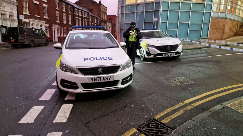 Two 'armed men' brought Sheffield city centre to a standstill.
