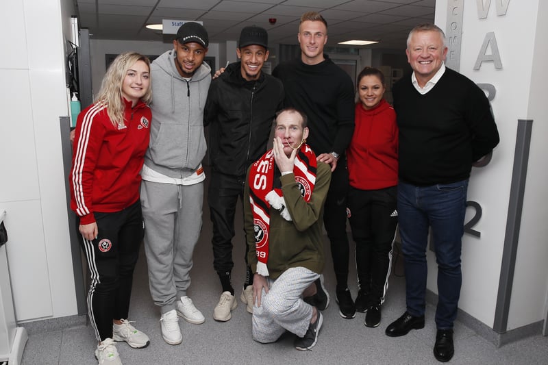 Maddy Cusack, Lys Mousset, Callum Robinson, Simon Moore, Althea Paul and Chris Wilder during their visit to patients and staff of the Weston Park Hospital, Sheffield. Picture date: 17th December 2019.