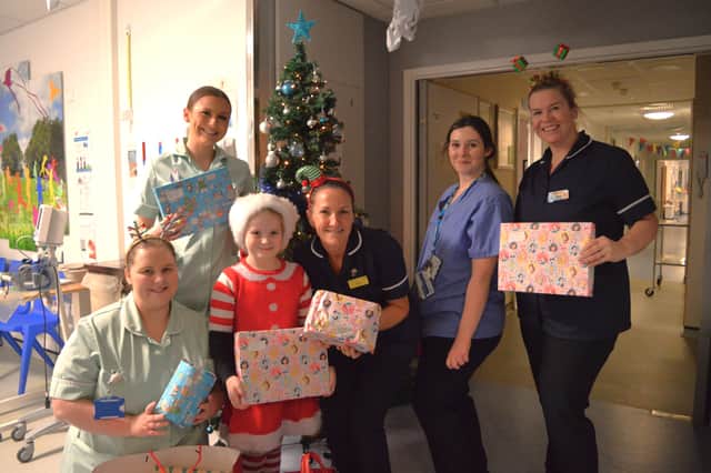 Sophia, aged eight, donated over 100 presents to the children's ward at Doncaster Royal Infirmary.