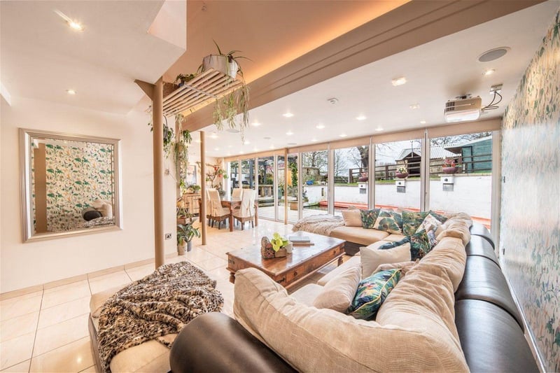 The living area has underfloor heating and an integral TV projector screen. Photo courtesy of Zoopla