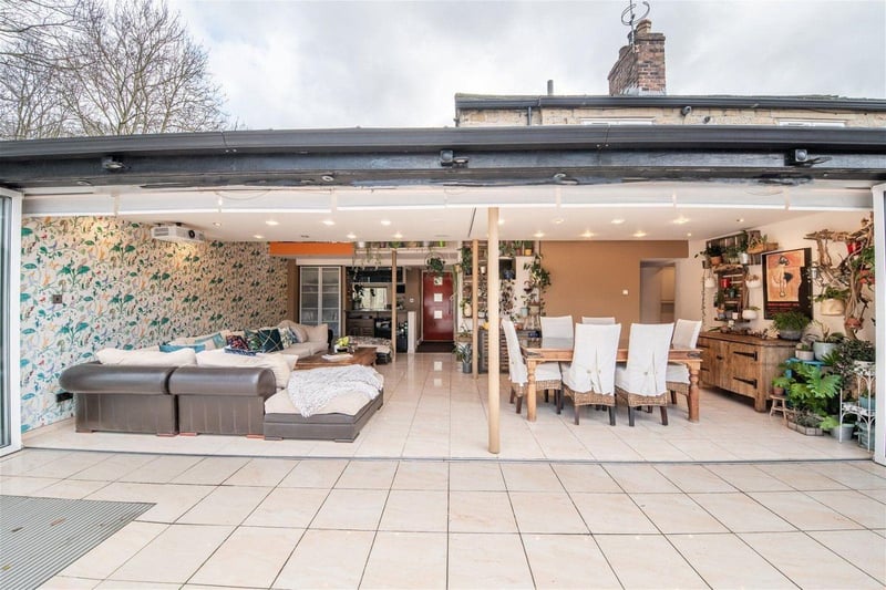 A full wall of bi-folding doors in the open plan living/dining area overlooks the stunning gardens. Photo courtesy of Zoopla