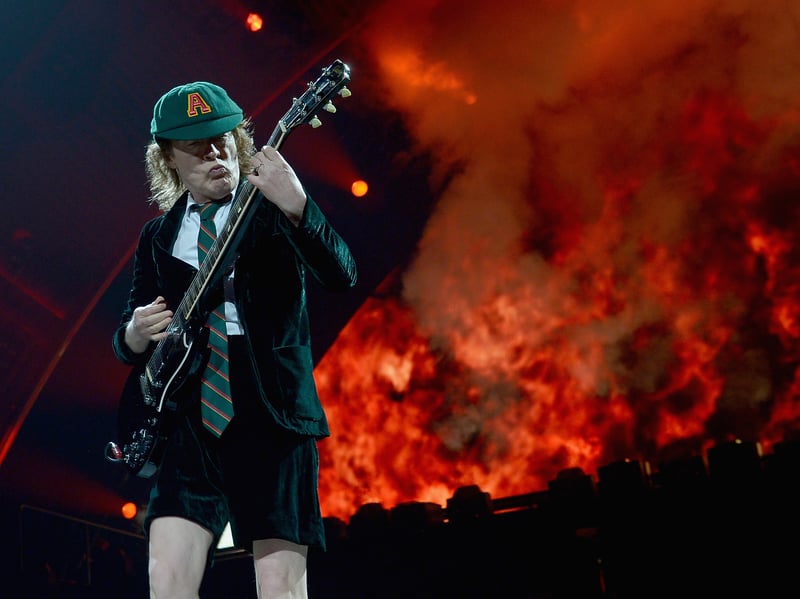 The only remaining original member of the hard rock band AC/DC, Young is known for his energetic performances and schoolboy-uniform stage outfits. A famous collector of Rangers Strips.