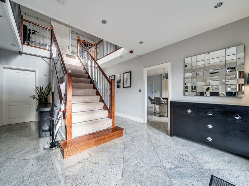 The large entrance hall and staircase will lead you upstair to the five large bedrooms. (Photo courtesy of Zoopla)