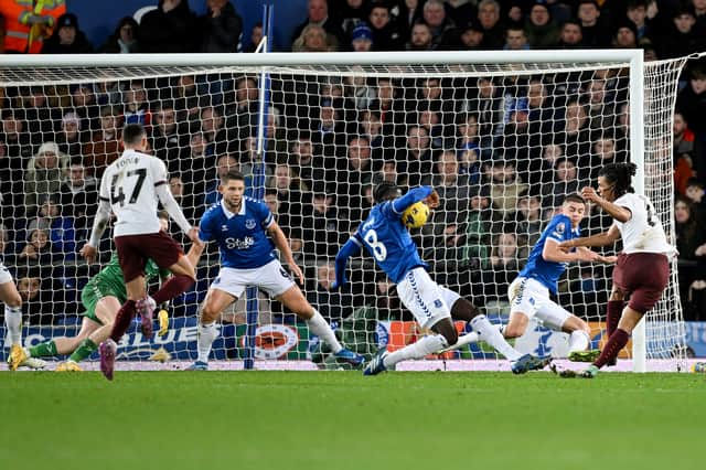 Amadou Onana of Everton commits handball to concede a penalty during the Premier League match between Everton FC and Manchester City at Goodison Park on December 27, 2023 in Liverpool, England. (Photo by Michael Regan/Getty Images)