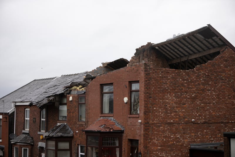 Roofs can be seen ripped off homes on Hough Hill Road. Picture: Ryan Jenkinson/Getty Images
