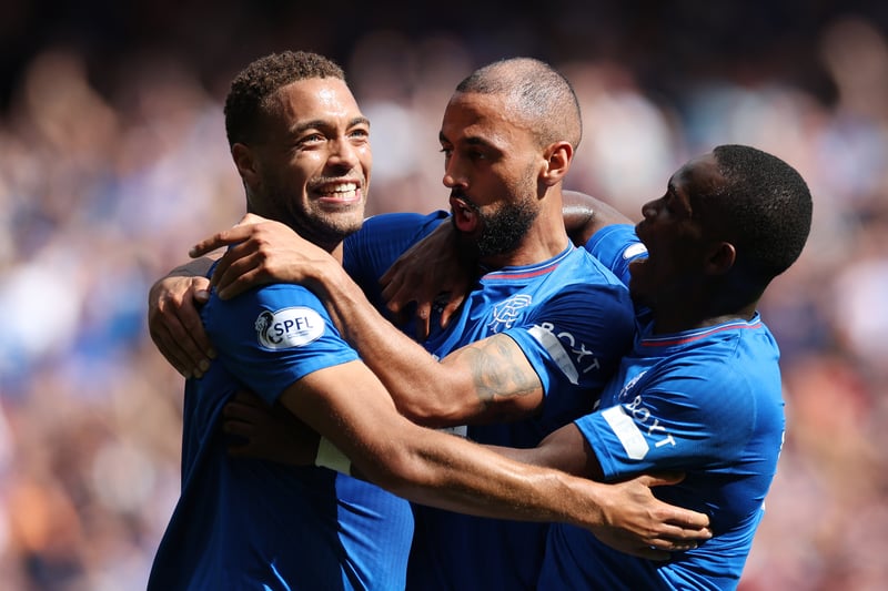 Kemar Roofe of Rangers celebrates with Rabbi Matondo and Cyriel Dessers