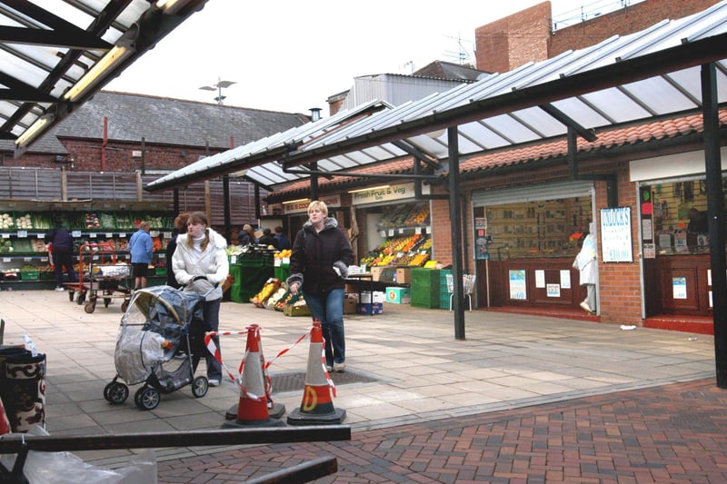 Browsing round the market back in 2004. Tell us if you loved to shop there 20 years ago.