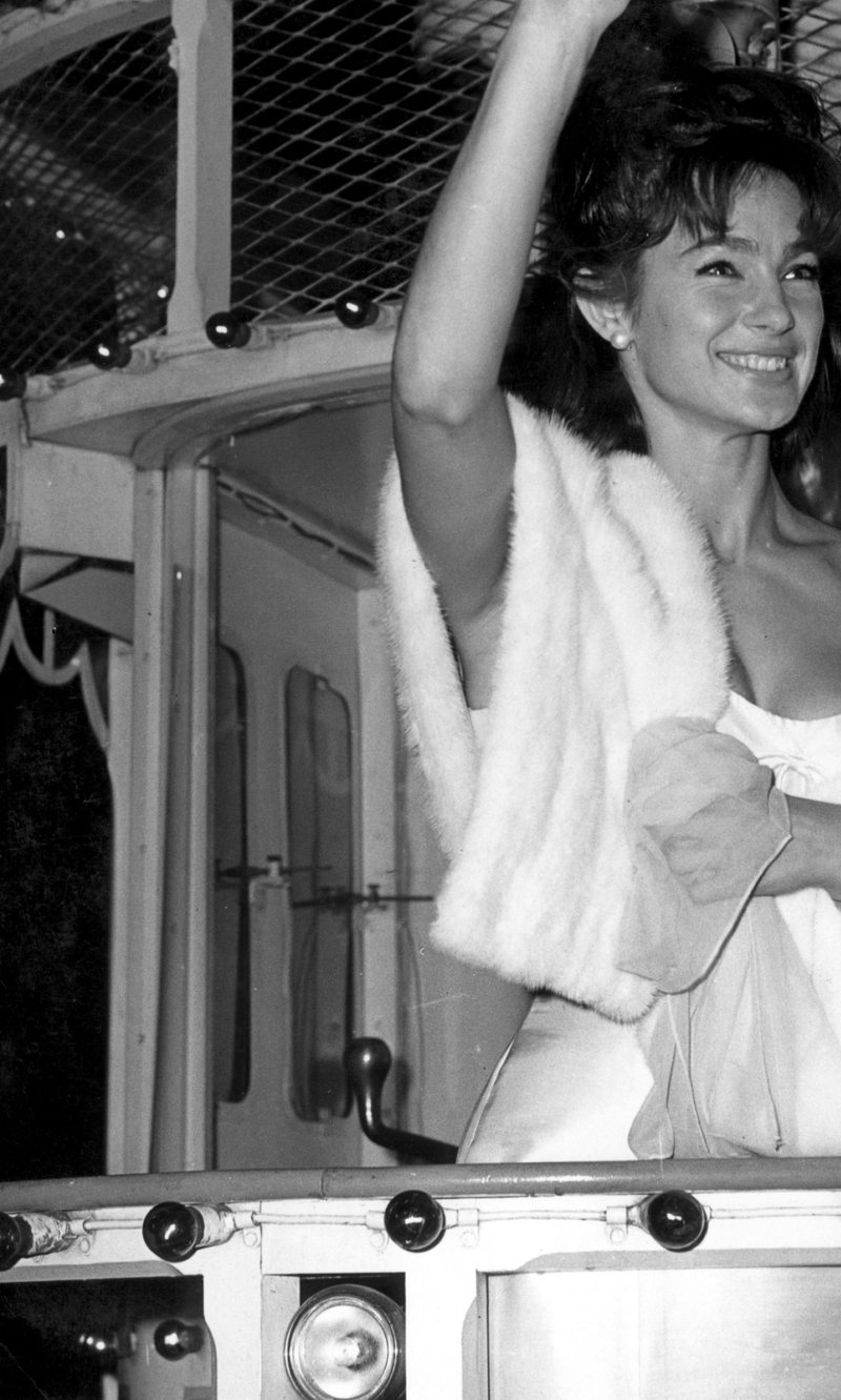 Shirley Anne Field on board an illuminated tram with a wave and a smile when she came to Blackpool to switch on the 1962 Illuminations