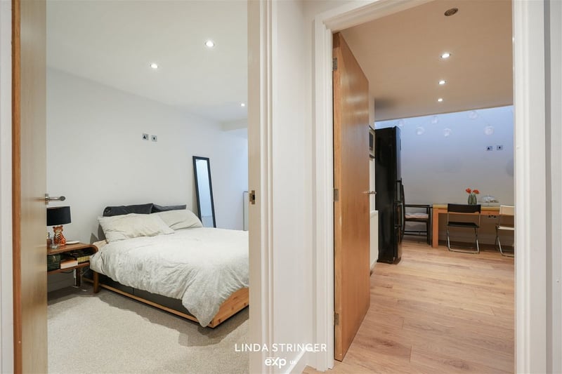On the lower level is the kitchen and dining area, the master bedroom with an en-suite, and a storage room. Photo: Zoopla
