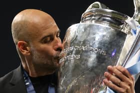 Pep Guardiola, Manager of Manchester City, kisses the UEFA Champions League trophy after the team's victory during the UEFA Champions League 2022/23 final match between FC Internazionale and Manchester City FC at Ataturk Olympic Stadium on June 10, 2023 in Istanbul, Turkey. (Photo by Michael Steele/Getty Images)