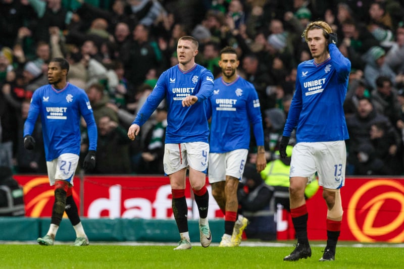 Rangers players look dejected after Paulo Bernardo gives Celtic's the lead at Parkhead.