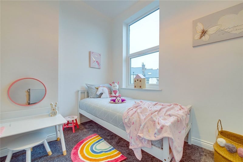 The other first-floor bedroom is slightly smaller, perfect for a guest bedroom or child's room.