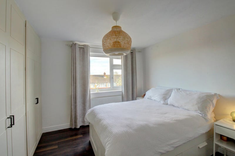 The property boasts three generously sized bedrooms on the first floor.