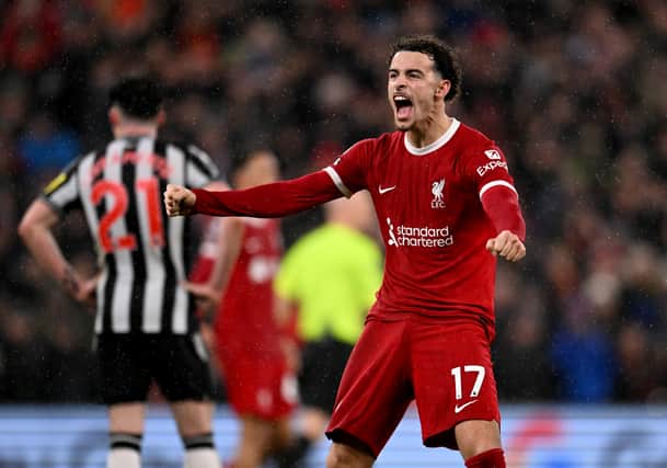  Curtis Jones of Liverpool celebrates after scoring the second goal during the Premier League match between Liverpool FC and Newcastle United at Anfield on January 01, 2024 in Liverpool, England. (Photo by Andrew Powell/Liverpool FC via Getty Images)