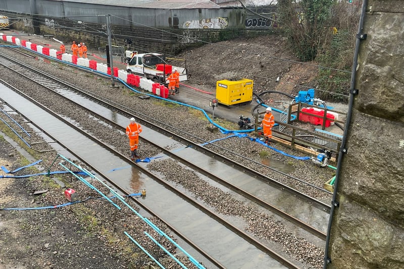 Teams from Network Rail were seen at the scene as they try to resolve the situation.