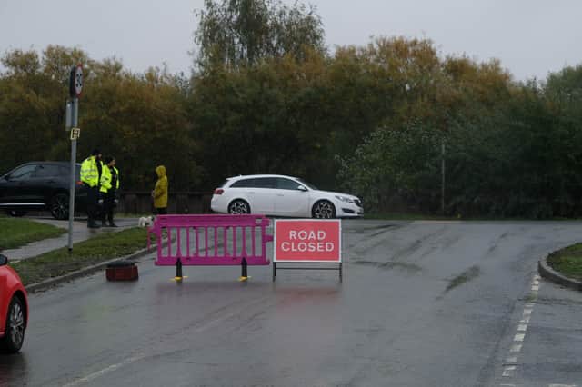 File picture by Dean Atkins shows a road closed in Catcliffe to flooding late in 2023.