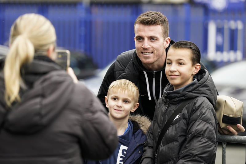 Conor Shaughnessy looked relaxed before kick-off as he poses for a photo with these young Blues supporters.