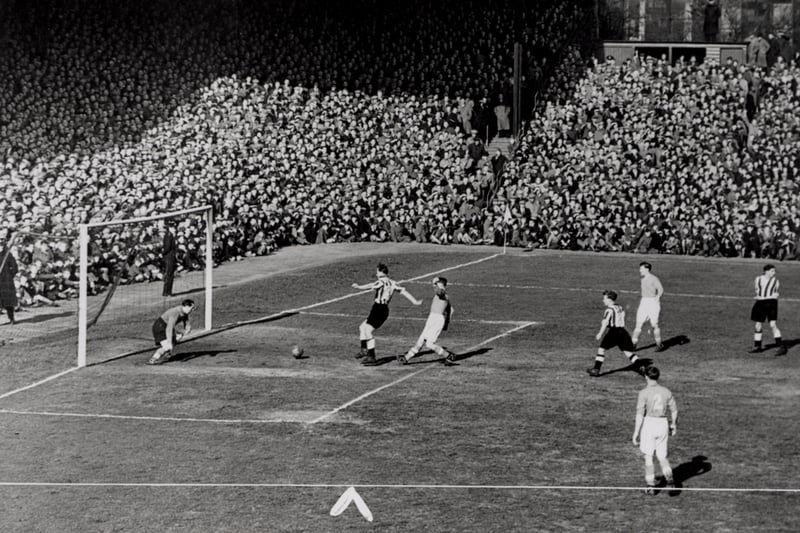 Newcastle United in action at St James' Park c1950.