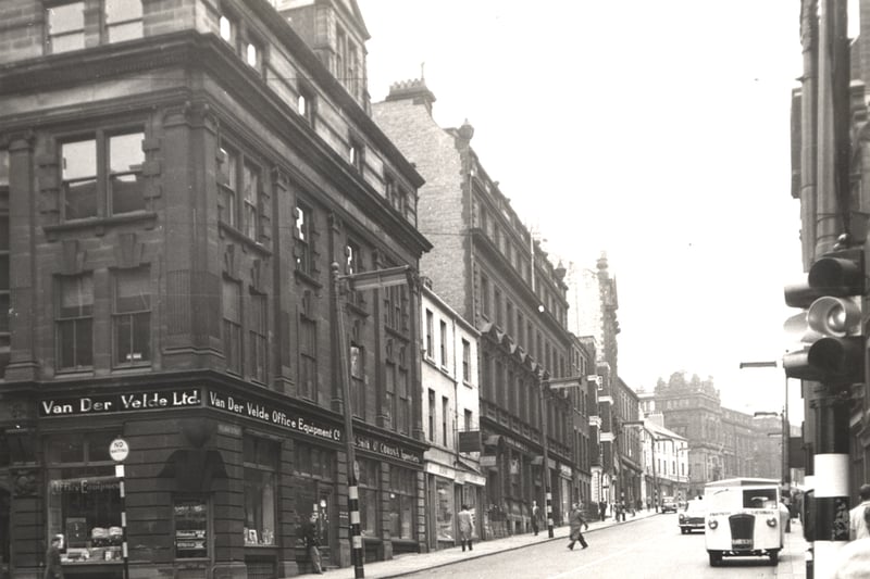 A view of Pilgrim Street Newcastle upon Tyne taken in 1959. The photograph is looking up Pilgrim Street. 'Van Der Velde Office Equipment Co.' is in the foreground to the left.