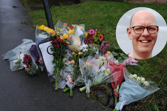 Flowers mark the spot on College Close, Burngreave, where Chris Marriott died after being hit by a car while trying to help a stranger.
