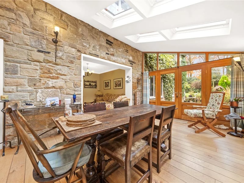 The garden room with access to the rear garden gets lots of natural light from six skylights.