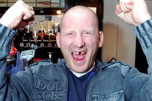 A happy fan shows his joy at the derby match in Keano's Bar.