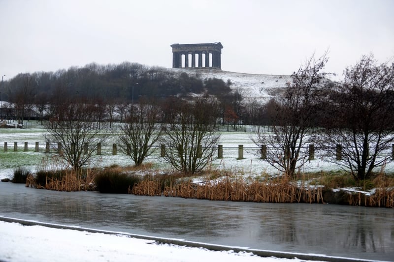 A dusting of snow and a frozen pond at Herrington Country Park in 2015.