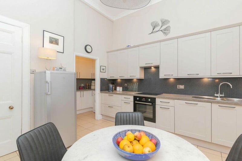 The kitchen space is modern with there being a useful utility room just off. 
