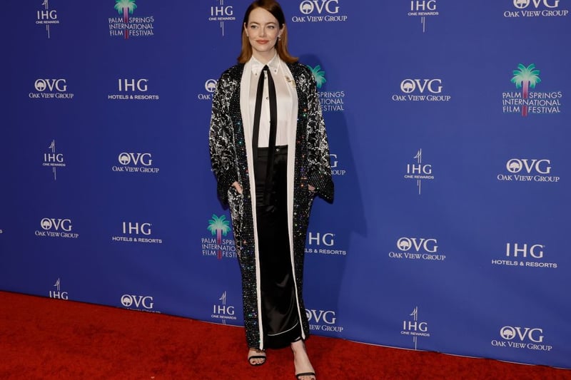 Although I was less keen on Emma Stone's robe, I thought she looked very Old Hollywood in black trousers, black tie and silk white shirt.
