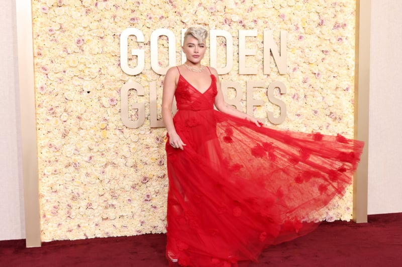 Although some were not a fan of Florence Pugh's Golden Globes gown, I thought her edgy hairstyle gave her red Valentino gown a different cooler vibe.