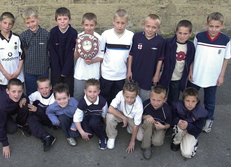 Bramley Juniors under-10s receive the sportsmanship award after finishing runners-up in Division D, at the Sheffield Junior Sunday League presentation night in May 02 2002