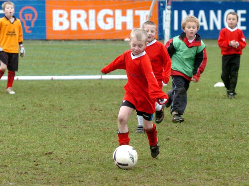 Youngsters from Valley Park Primary (in red tops) and St Andrews Junior (green) take part in the Sheffield Football Festival at the Sheffield FC Stadium, Dronfield, in November 2007