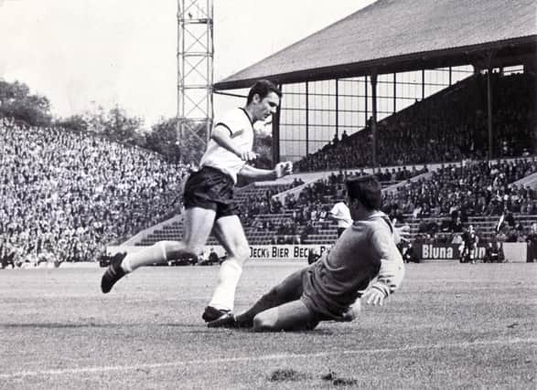 World Cup Quarter Final 1966 at Hillsborough - 23rd July 1966
West Germany v Uruguay
Germany's second goal... as Beckenbauer runs the ball past Uruguay keeper, Mazurkieviez, into the empty net.
