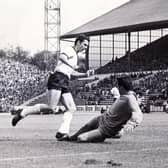 World Cup Quarter Final 1966 at Hillsborough - 23rd July 1966
West Germany v Uruguay
Germany's second goal... as Beckenbauer runs the ball past Uruguay keeper, Mazurkieviez, into the empty net.