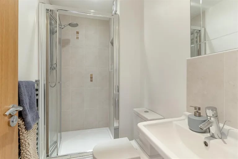 Two additional shower rooms are also found in the home.