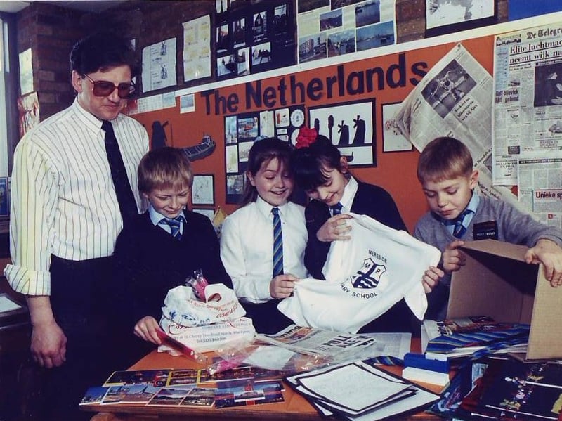Mereside Primary School, Blackpool, March 22 1991
Teacher Robin Thomson helps pupils pack a box for their Dutch exchange school with pupils, from left, Daniel Harris, Claire Green, Kelly Roberts and Michael Taylor