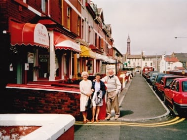 Rod Lea's wife Liz (centre) with his parents Violet and Wilf, standing on Blundell Street, Blackpool, in 1991