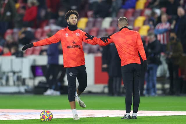 Myles Peart-Harris of Brentford warms up ahead of the Premier League match between Brentford and Manchester City at Brentford Community Stadium on December 29, 2021 in Brentford, England. (Photo by Catherine Ivill/Getty Images)