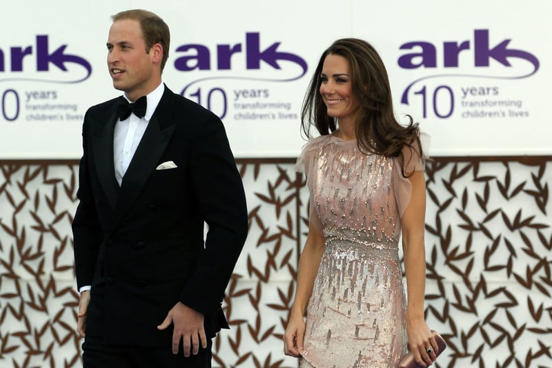 Catherine, Princess of Wales (with Prince William) chose a pale pink Jenny Packham dress to an ARK dinner in 2011.